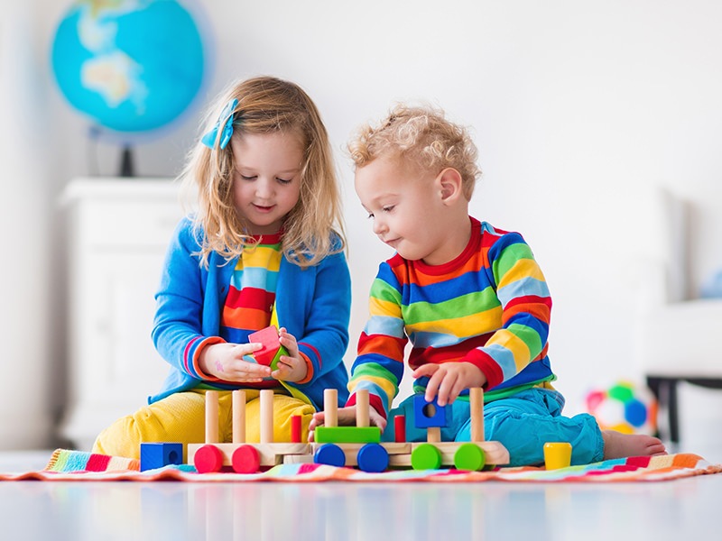 Kids Playing with Wooden Toys